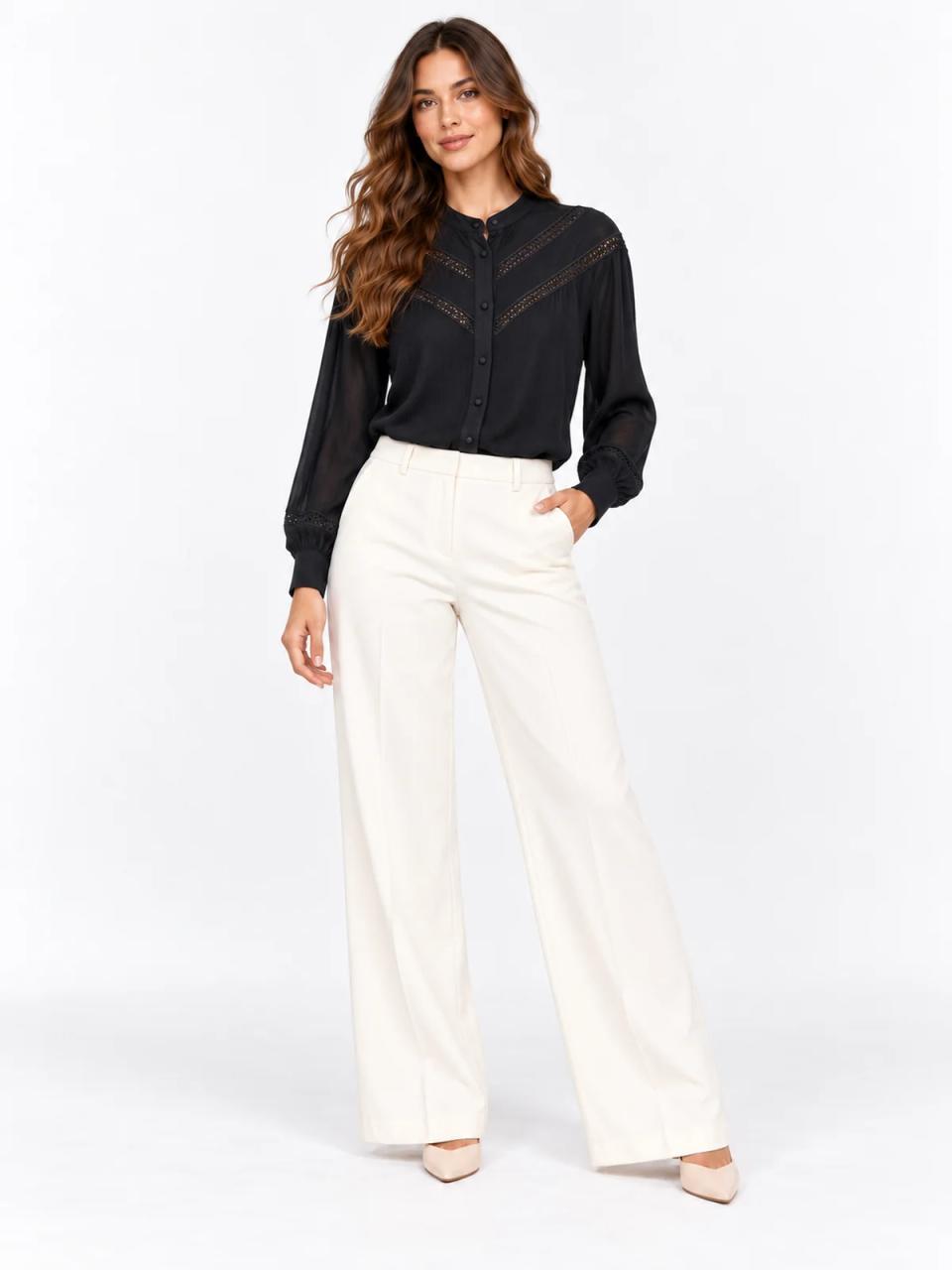 Black embroidered blouse, worn, front view